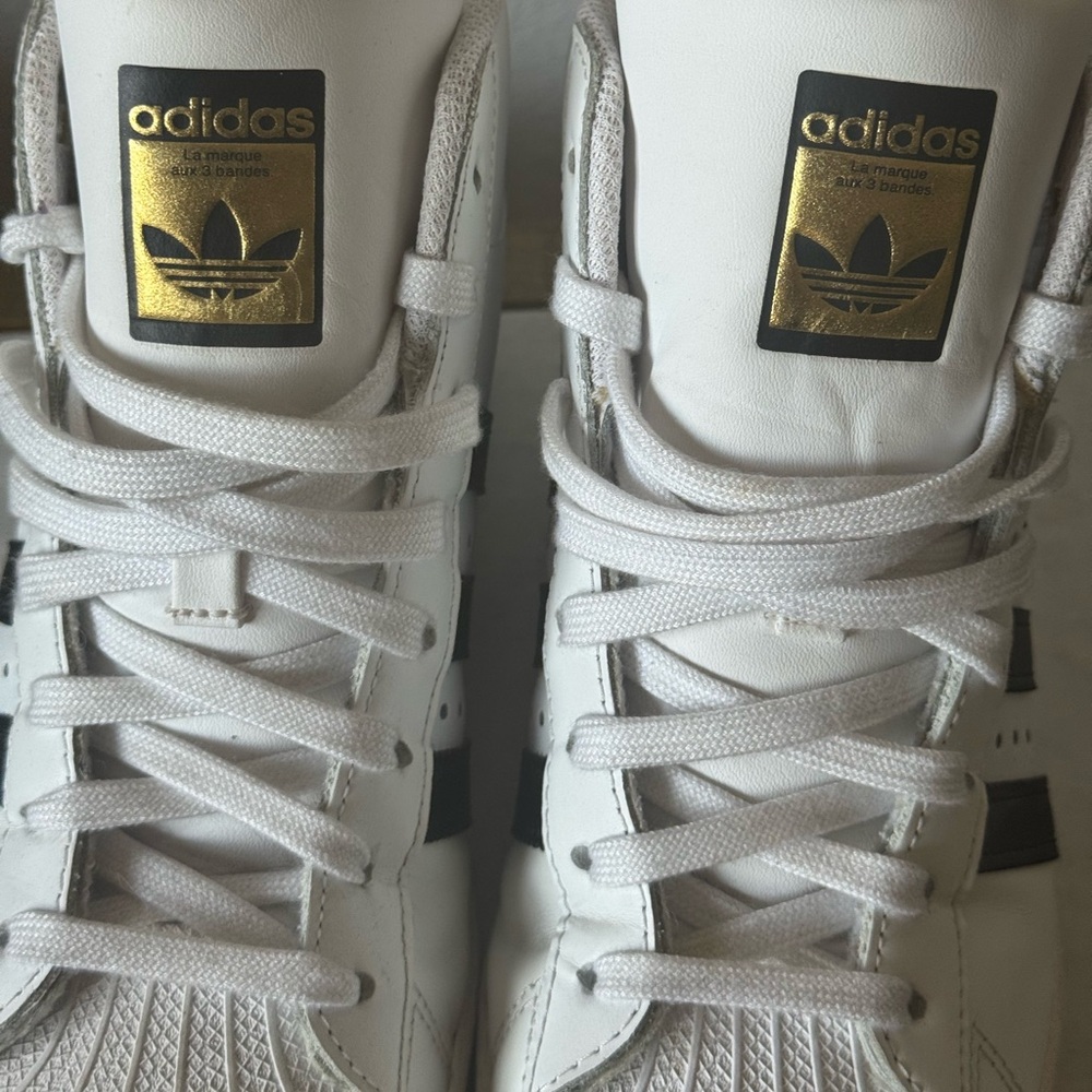 Adidas White Sneakers with Gold Details